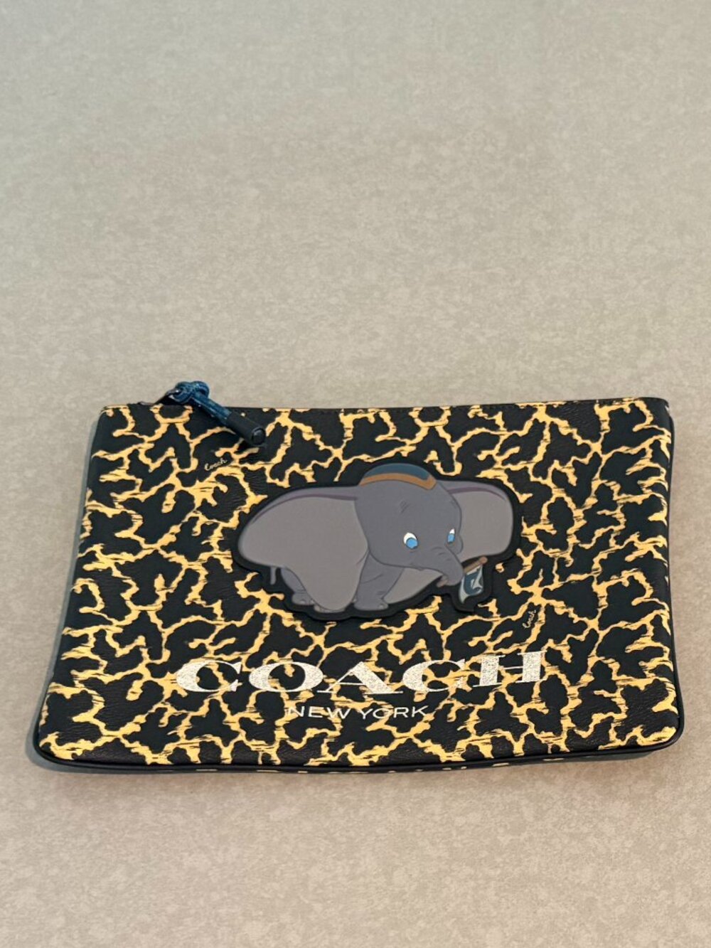 Disney X Coach Large Pouch with Wavy Animal Print and Dumbo